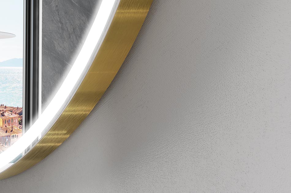 Onregelmatig gevormde spiegel met zachte sfeerverlichting voor elegante interieurs | ARTFORMA