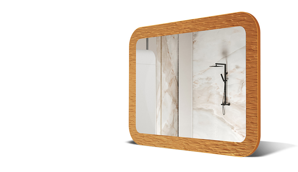 Spiegel in een frame met metalen decoratie. Symbool van moderne elegantie
